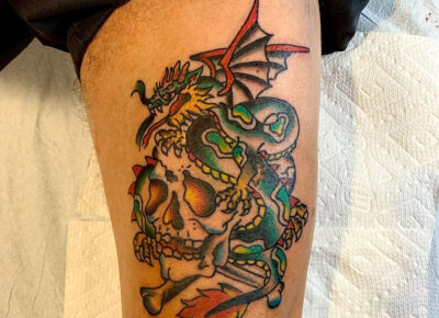 Skull and dragon tattoo