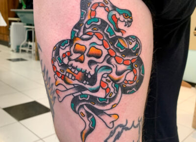 Snake and skull tattoo